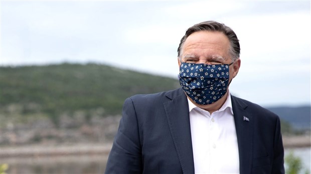 François Legault précise les conditions sur le port du masque en extérieur